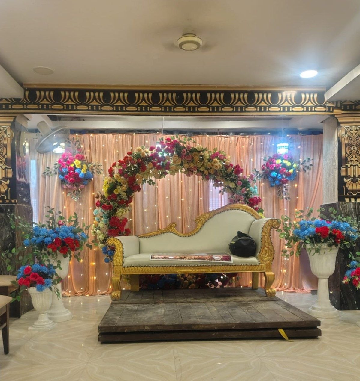 Cozy green corner seating at Buddha Vihar